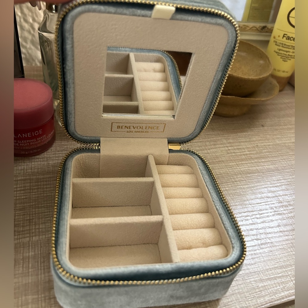 Velvet travel jewelry box with mirror and hidden necklace compartment